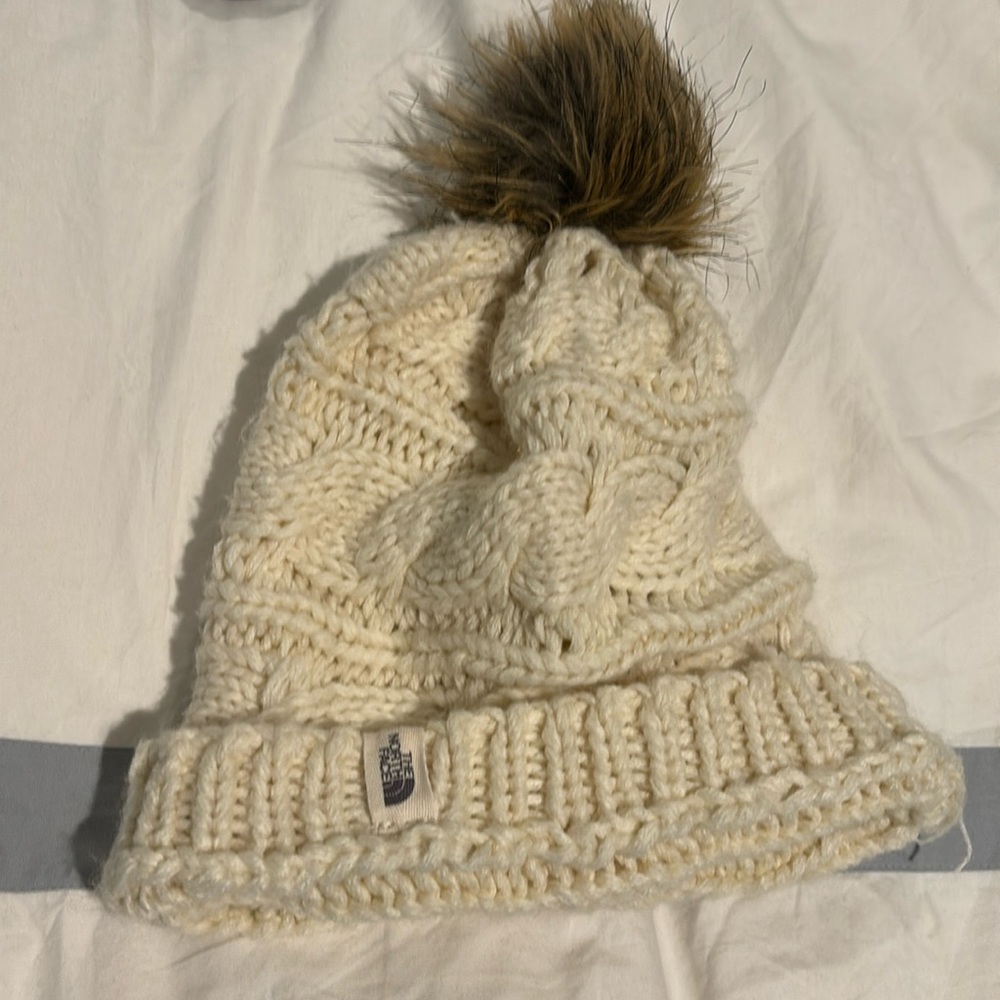 North Face knit hat with a PomPom